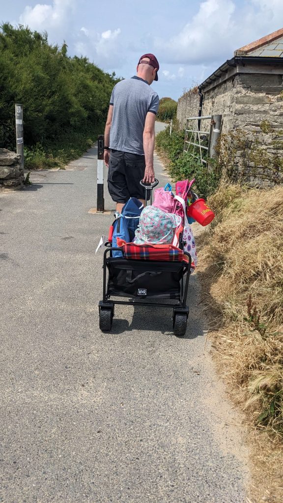 Using a beach trolley to carry kids